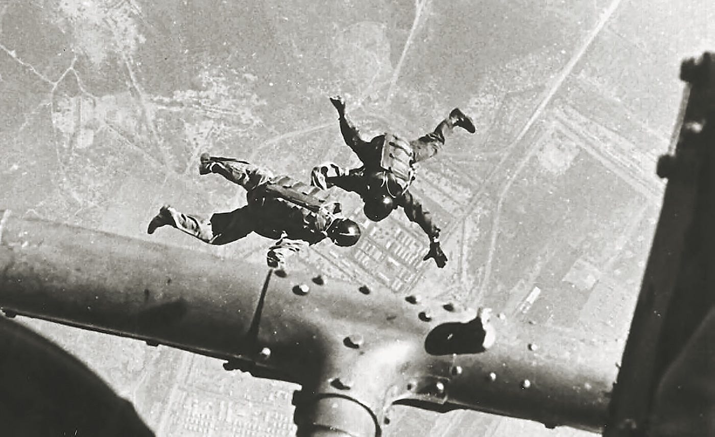 Photograph of 2 MACV-SOG HALO Jumpwe from a Huey Helicopter during the Vietnam War.

Part of the autobiography of Dr. Anthony J. Carbone, Son in the Shadow of a Green Beret Hero.