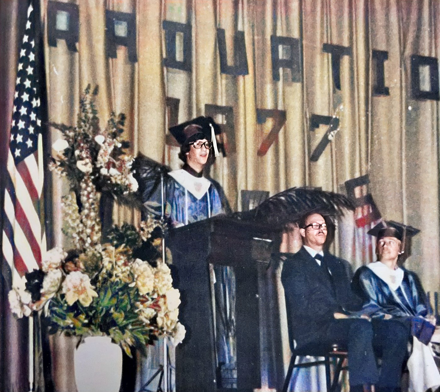 Giving my Valedictorian Address at the Class of 1977 Graduation.

Dr. Anthony Carbone’s autobiography. Bad Kreuznach American High School. Germany. 1977. Army Brats. Validictorian.