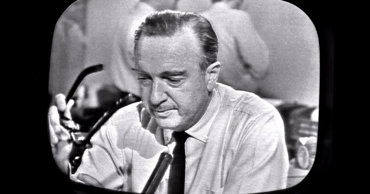 Walter Cronkite as he removes his glasses while announcing the death of President John F. Kennedy on CBS News, as seen from a television monitor on November 22, 1963.
Dr. Carbone’s Autobiography: A Son in the Shadow of a Green Beret Hero