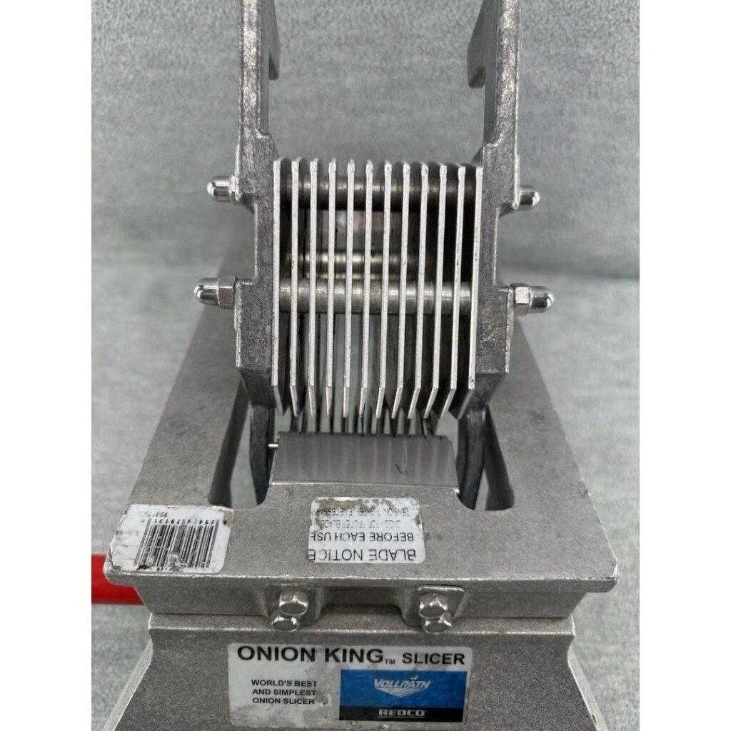 Photo of onion slicing machine used to cut a couple of tons of onions a day for the Carpentitos.

Part of the autobiography of Dr. Anthony J. Carbone. Believe Nothing You Hear, and Only Half of What You See--A Memoir of Service, Shame, and the Search for Truth.