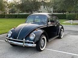 Black Volkswagen Beetle circa 1960 that 8 of us piled into to drive from Heidelberg, Germany to Paris, France when my Nana Carbone was visiting us in Heidelberg.

Part of the autobiography of Dr. Anthony J. Carbone, Son in the Shadow of a Green Beret Hero