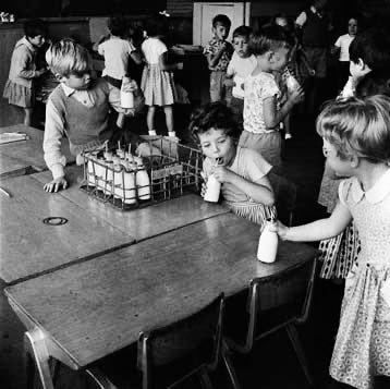 Children drinking milk from tiny glass milk bottles in the cafeteria in Vermont in the 1960s.
Part of the autobiography of Dr. Anthony J. Carbone, Son in the Shadow of a Green Beret Hero.