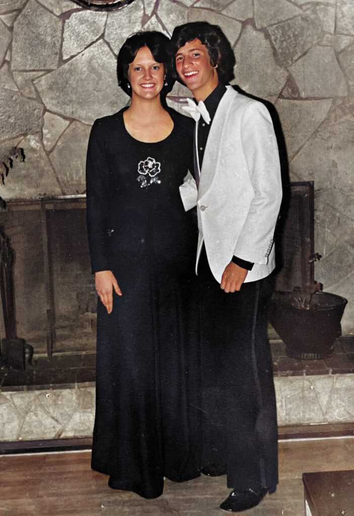 Portrait of me in a tuxedo with my friend Debbie Wingfield at the Bad Kreuznach Senior Class Prom 1977 on a boat cruising down the Rhein River.  Biography of Dr. Anthony J. Carbone.