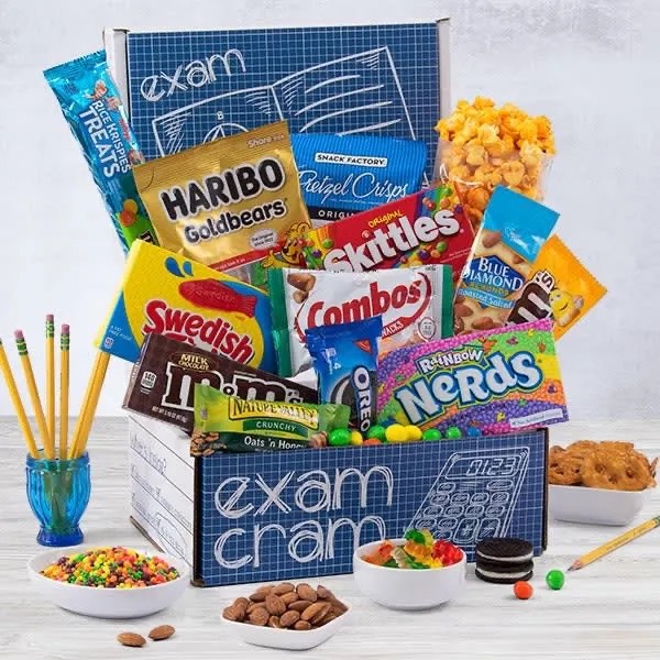 Exam goody box filled with treats including Haribo Gummi Bears, Swedish Fish, M&Ms, Skittles and popcorn.  Biography of Dr. Anthony J. Carbone.