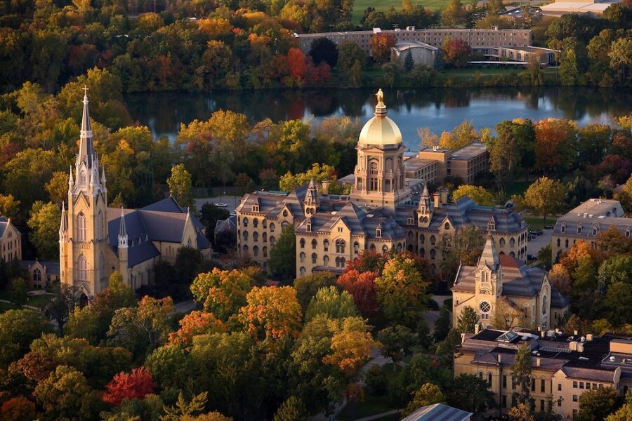 Aerial view of campus of University of Notre Dame. Showing the Golden Dome and Our Lady above the Admin Building. Autobiography of Dr. Anthony J. Carbone.