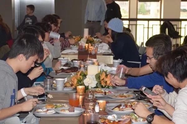 Thanksgiving dinner at the University of Notre Dame.  Biography of Dr. Anthony J. Carbone.