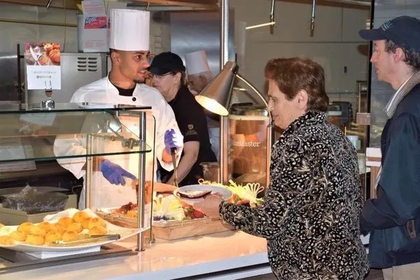Thanksgiving dinner at the University of Notre Dame.  Biography of Dr. Anthony J. Carbone.