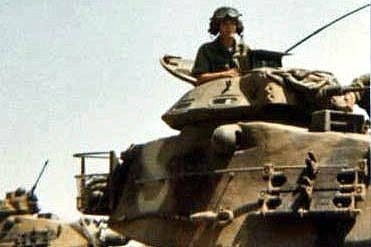Me in the tank commander's cupula of an M60A1 Main Battle Tank during armor training.  Biography of Dr. Anthony J. Carbone.