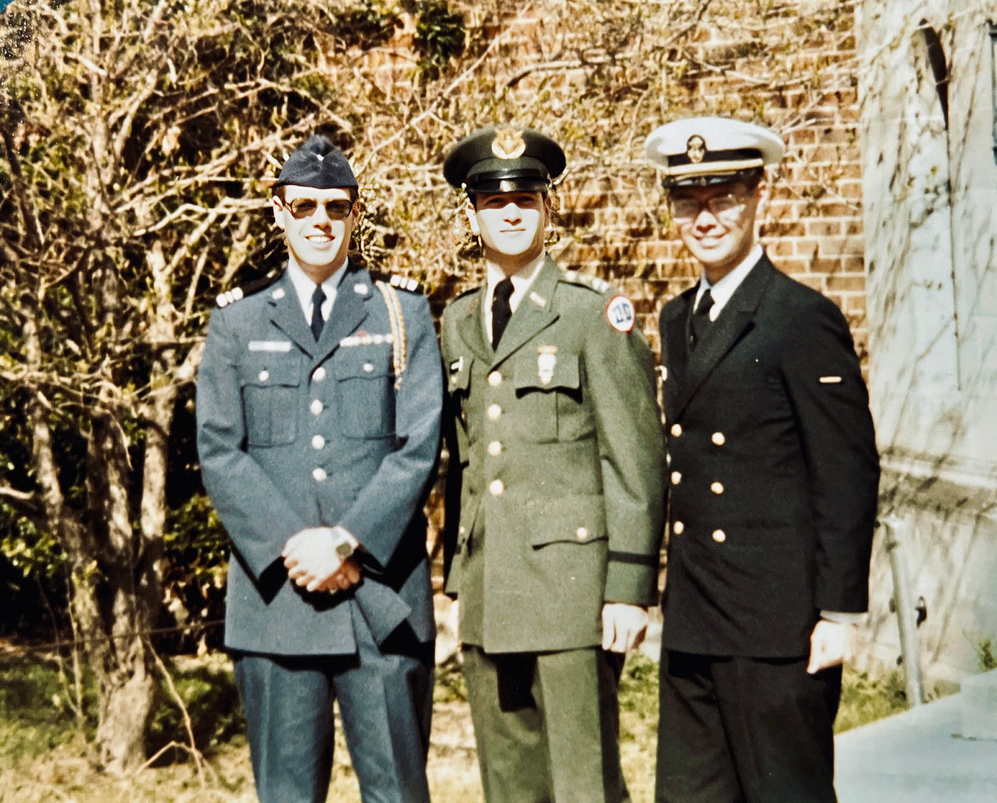3 ROTC cadets in dress uniform in front of Fisher Hall at the University of Notre Dame.  Anthony J Carbone (Army), Chris Kane (USAF), and one US Navy midshipman.