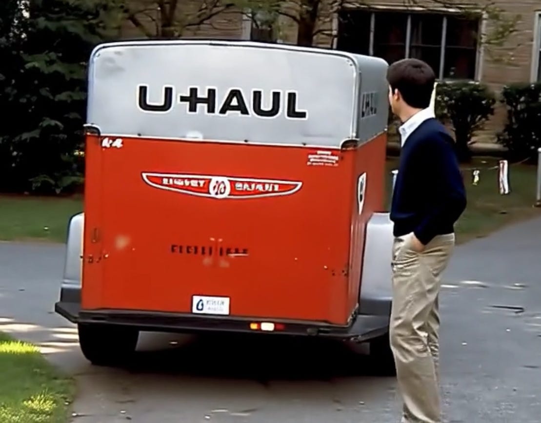 Photograph of me standing in front of the U-Haul that I used to move out of Fisher Hall at the University of Notre Dame on May 17, 1981 following graduation. Biography of Dr. Anthony J. Carbone.