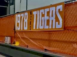 Wheaton Central High School orange banner with "1978 Tigers".  Autobiography of Dr. Anthony J. Carbone.