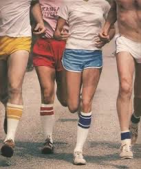 Photo of girls running circa 1970s in athletic shorts, tube socks and sneakers.  Autobiography of Dr. Anthony J. Carbone.
