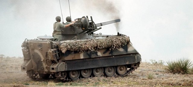 Tracked Vulcan air defense vehicle firing Vulcan gatling gun.  Biography of Dr. Anthony J. Carbone.