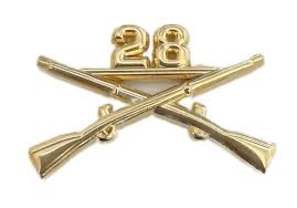 Sample Infantry Officer branch insignia.  Gold crossed muskets with 28th Infantry Regiment designation.  Biography of Dr. Anthony J. Carbone.
