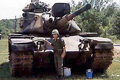 Me standing in front of an M60A1 Main Battle Tank during Armor Training.  Biography of Dr. Anthony J. Carbone.