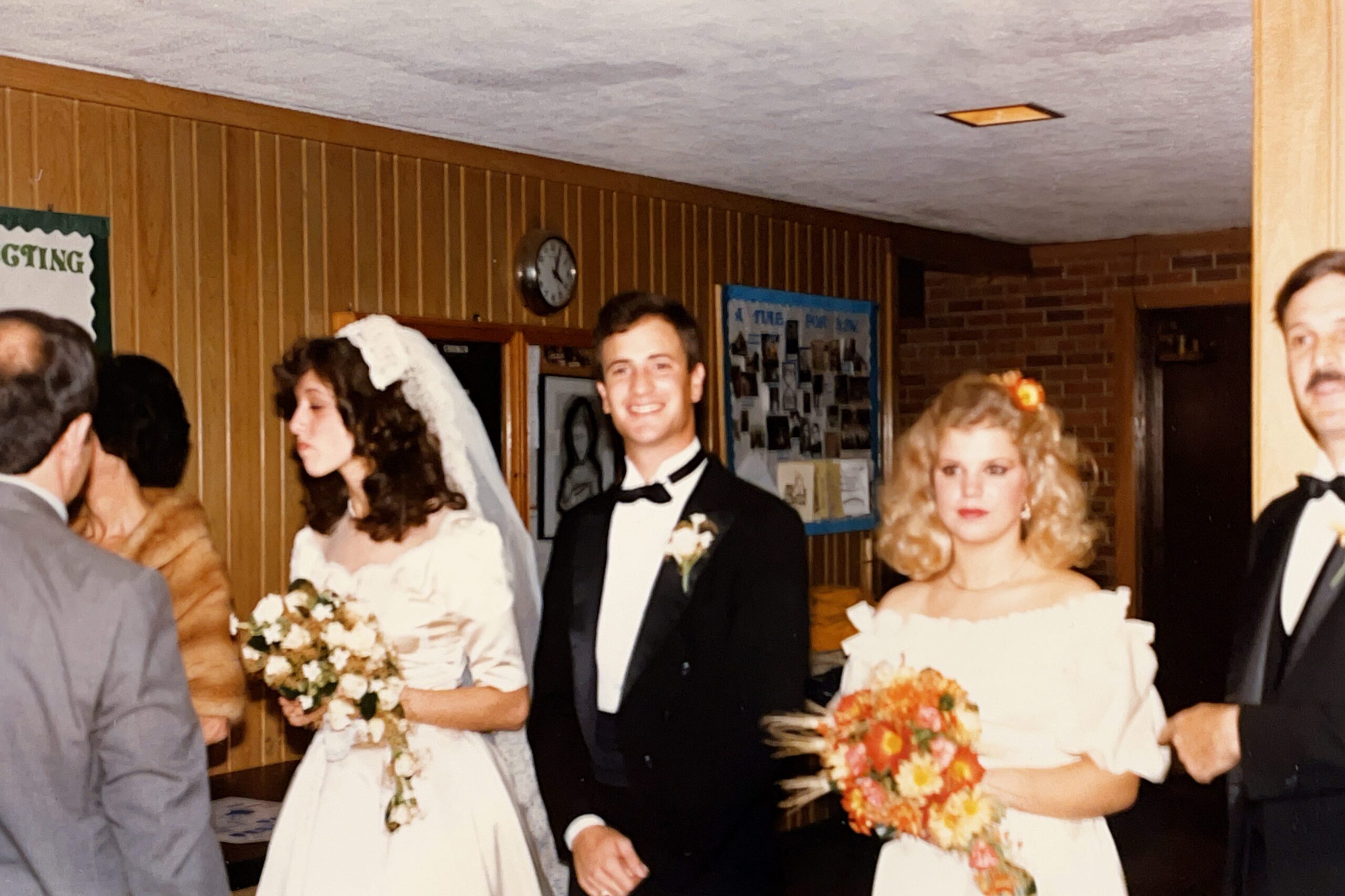 The wedding reception line for Lieutenant & Mrs. Anthony J. Carbone on October 30, 1982 in Wheaton, Illinois.