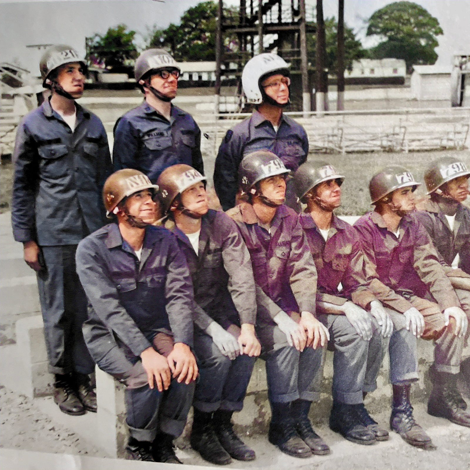 Photo of Airborne students at the U.S. Army Airborne Course.  Special Forces doctor wearing white skydiving helmet known as "Mushroom Head".  Biography of Dr. Anthony J. Carbone.