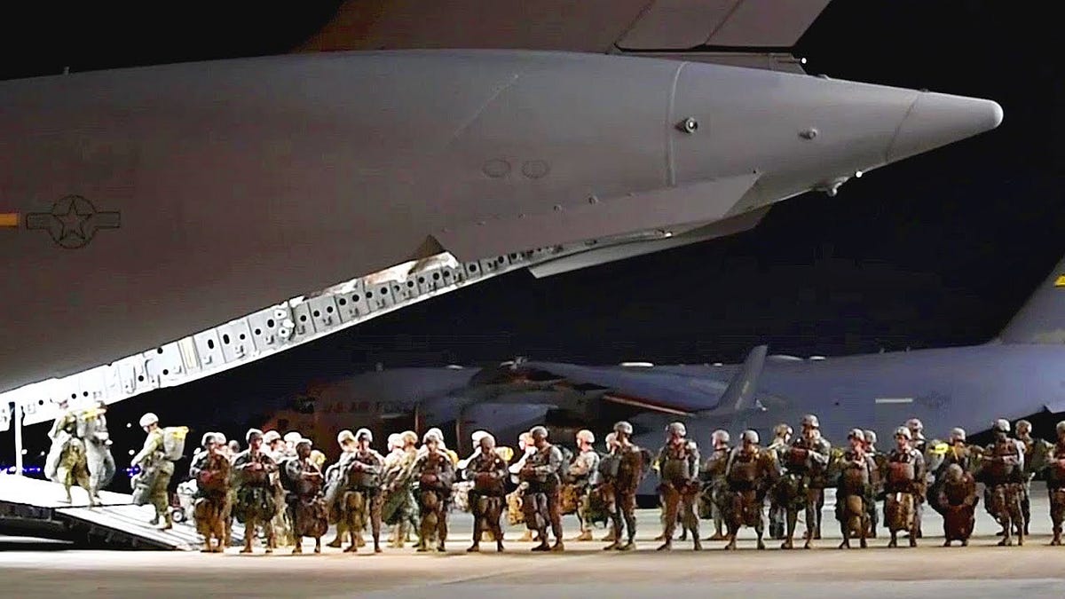 Night Jump at the U.S. Army Airborne Course at Fort Benning, Georgia.  Biography of Dr. Anthony J. Carbone.