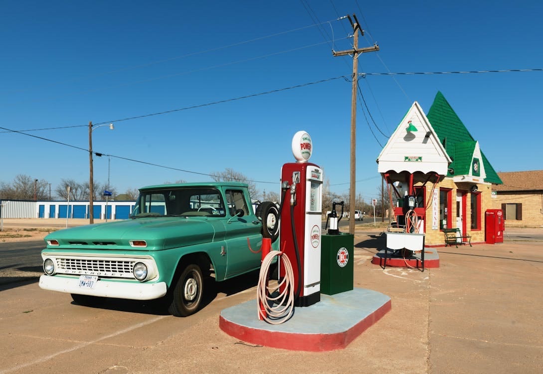 One pump gas station with small general store. Biography of Dr. Anthony J. Carbone.