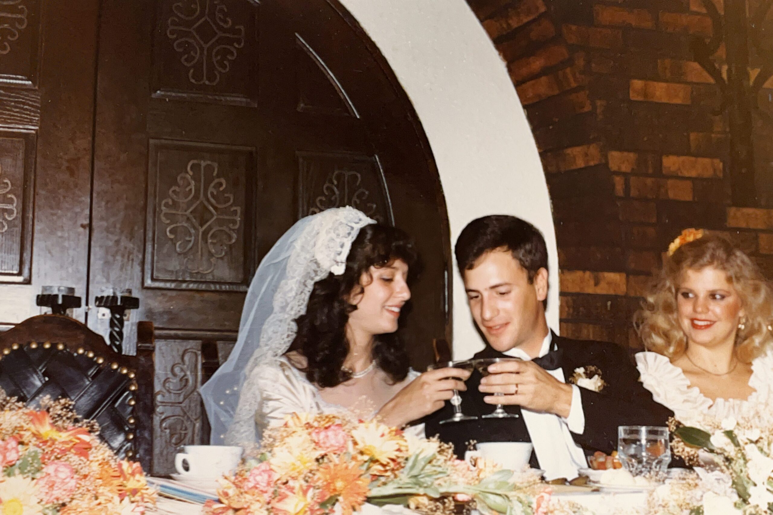 Our first toast at our wedding reception.  Mariann Schmitz Carbone with Anthony J. Carbone on October 30, 1982 in Wheaton, Illinois.