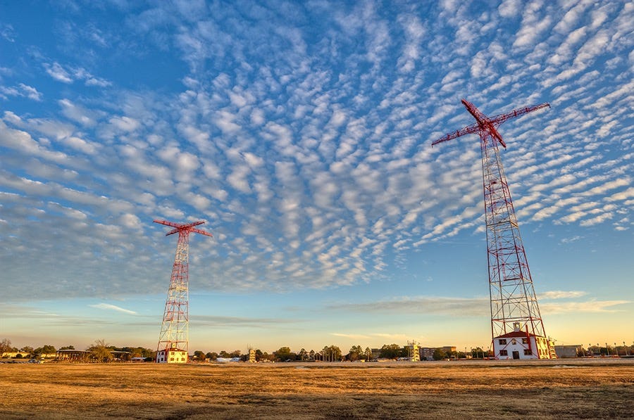 250-Foot Free-Drop Towers at the Airborne School at Fort Benning, Georgia.  Biography of Dr. Anthony J. Carbone.