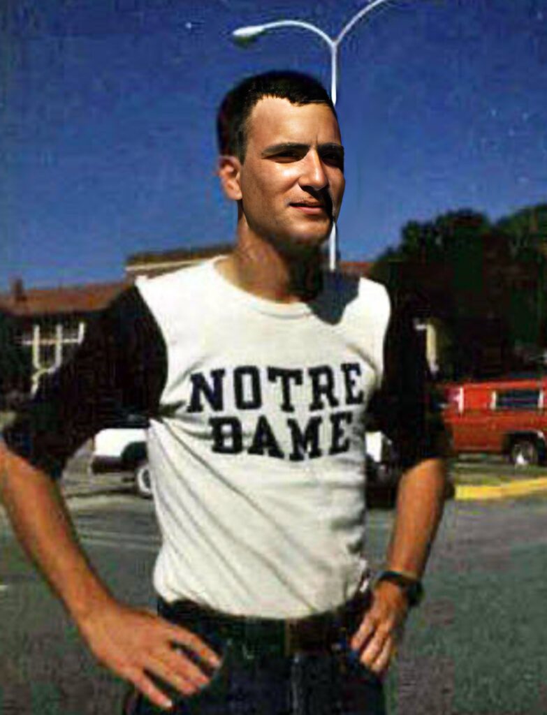 My with a short Airborne haircut wearing my "Notre Dame" baseball shirt and standing outside of Abrams Hall at Fort Benning, Georgia.  Biography of Dr. Anthony J. Carbone.