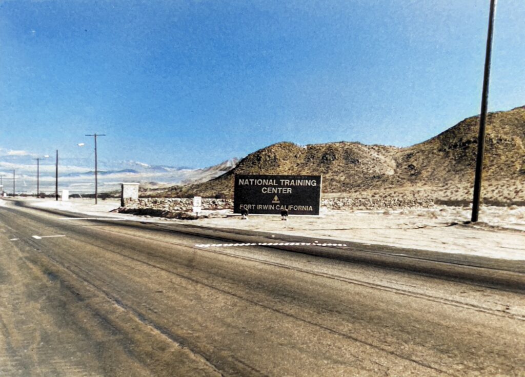 Fort Irwin Road from Barstow to Fort Irwin, California--just two lanes and no shoulders making it very dangerous to drive.  This shows the National Training Center at Fort Irwin, California.