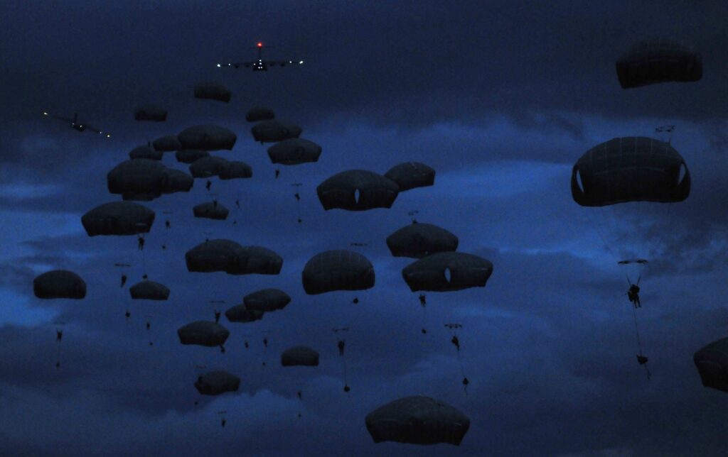 Night Jump at the U.S. Army Airborne Course at Fort Benning, Georgia.  Biography of Dr. Anthony J. Carbone.