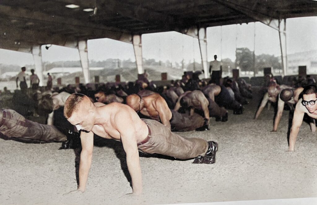 Members of the Airborne Course doing PT at Fort Benning.   Biography of Dr. Anthony J. Carbone.