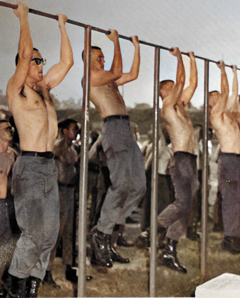 Members of the Airborne Course doing PT at Fort Benning.   Biography of Dr. Anthony J. Carbone.