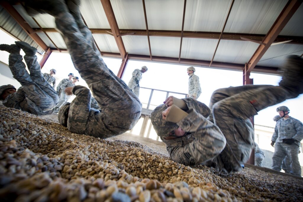 Parachute Landing Fall (PLF) training at the U.S. Army Airborne School, Fort Benning, Georgia.  Biography of Dr. Anthony J. Carbone.