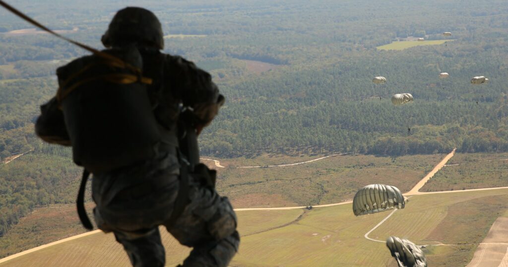Combat Equipment Jump at the U.S. Army Airborne Course at Fort Benning, Georgia.  Biography of Dr. Anthony J. Carbone.