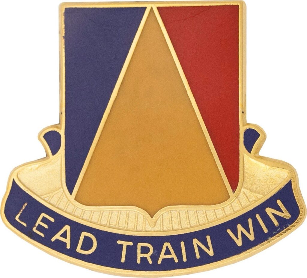 National Training Center Distinctive Unit Crest with "Lead, Train, Win" in Red, Blue and Red signifying the combat arms branches of Armor, Infantry and Artillery.  Biography of Dr. Anthony J. Carbone