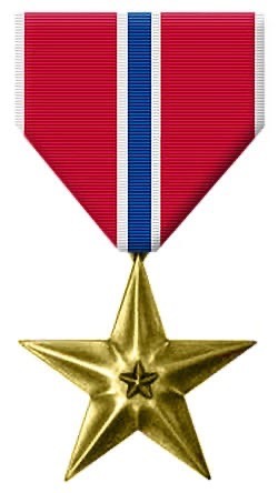 Bronze Star medal worn by Major Terry Zupan.  Biography of Dr. Anthony J. Carbone.