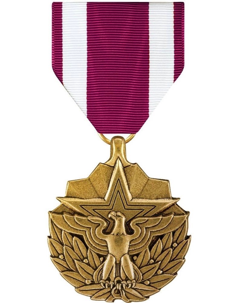Meritorious Service medal worn by Major Terry Zupan.  Biography of Dr. Anthony J. Carbone.