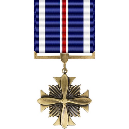 Distinguished Flying Cross medal worn by Major Terry Zupan.  Biography of Dr. Anthony J. Carbone.