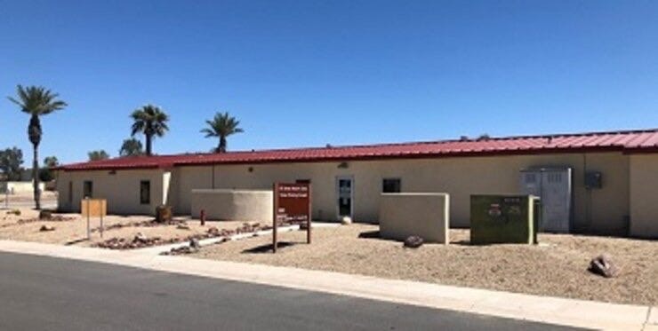 Photograph of Weed Army Community Hospital at Fort Irwin, California.  Biography of Dr. Anthony J. Carbone.