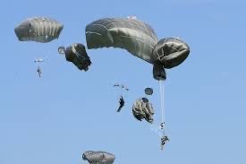 Photograph of military parachute malfunction.  Biography of Dr. Anthony J. Carbone