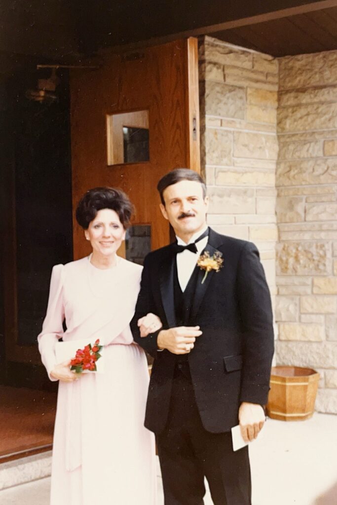 Colonel & Mrs. Anthony J. Carbone at the wedding of their son, Lieutenant Anthony J. Carbone to Mariann Schmitz at St. Michael's Catholic Church on October 30, 1982.