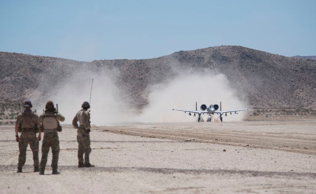 A-10 Warthogs at the National Training Center at Fort Irwin.  Biography of Dr. Anthony J. Carbone.