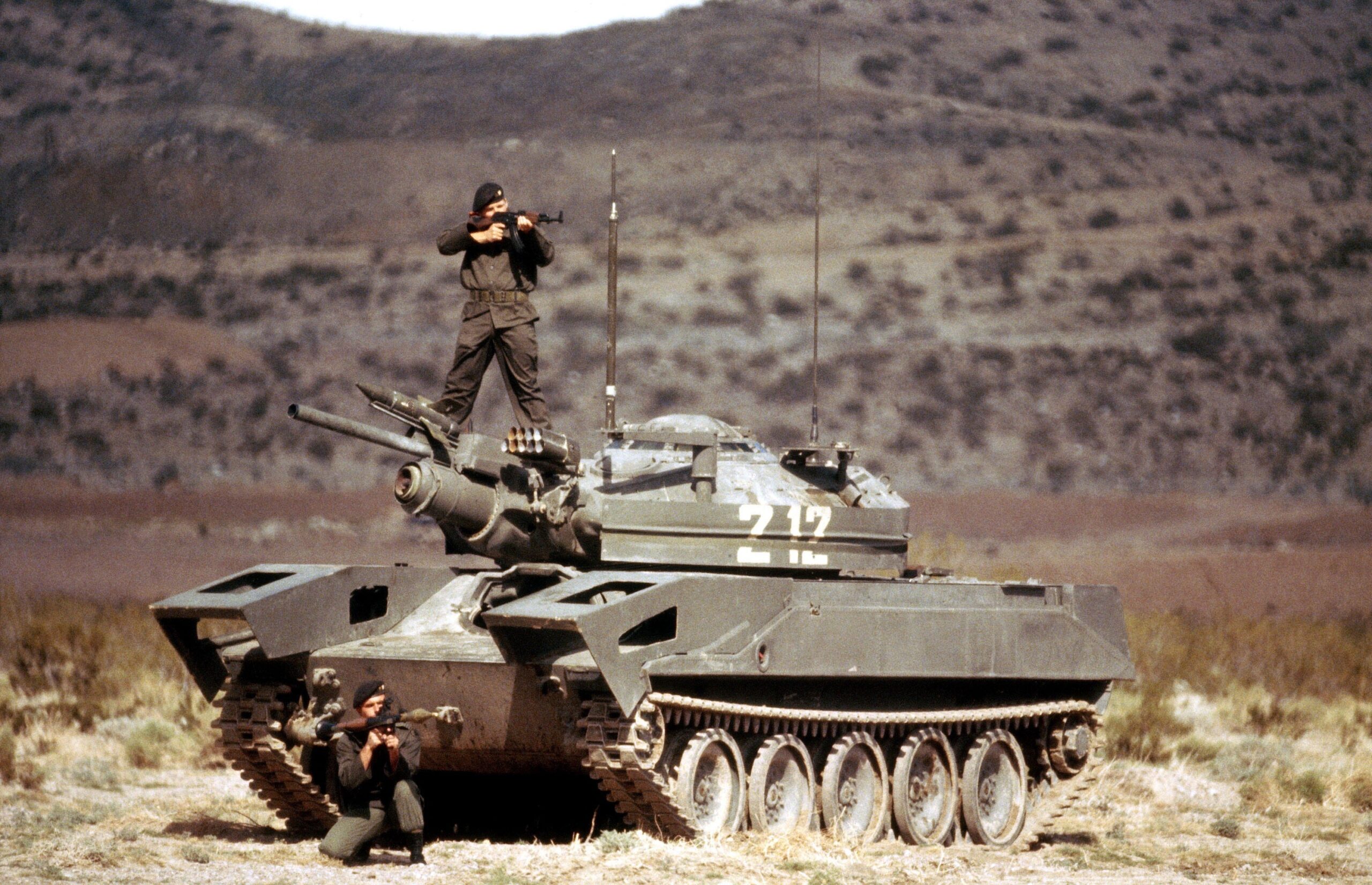 U.S. vehicles visually modified (VISMODs) to look like Soviet BMPs (Infantry fighting vehicles). At the National Training Center at Fort Irwin, California.  Biography of Dr. Anthony J. Carbone
