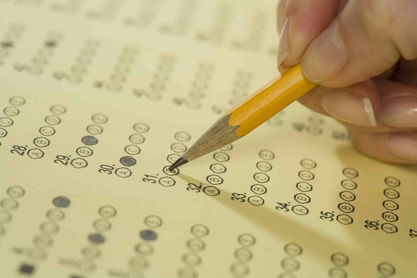 Photograph of classic standardized test answer sheet showing 5 answers (A-E) with a Number 2 pencil filling in ovals.
Biography of Dr. Anthony J. Carbone.