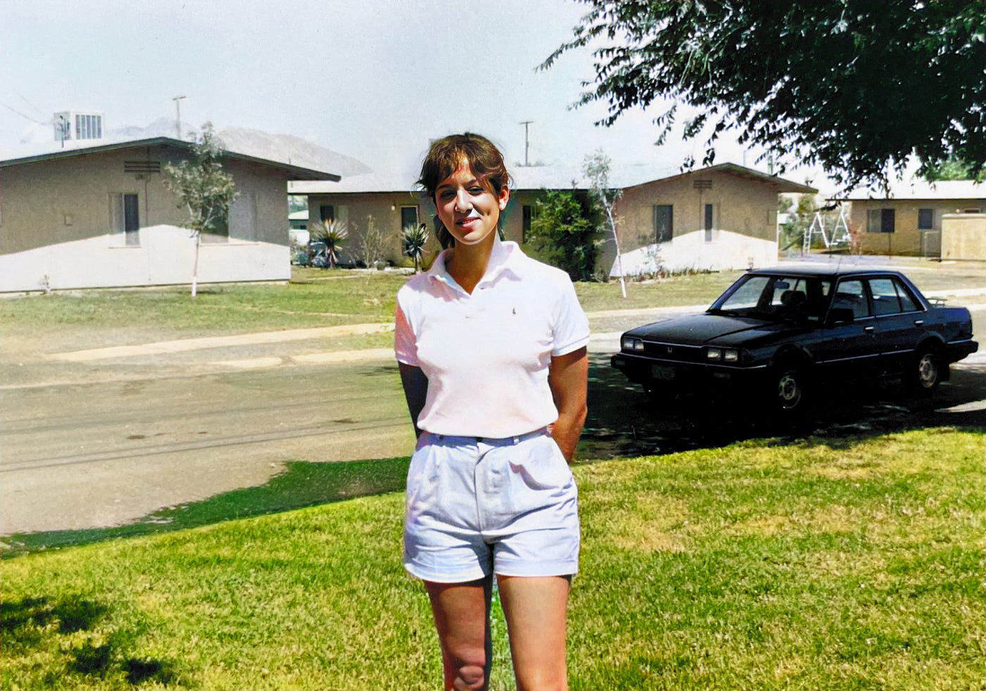 Mariann in front of our quarters in the Company Grade Officer housing area at Fort Irwin.  Biography of Dr. Anthony J. Carbone.