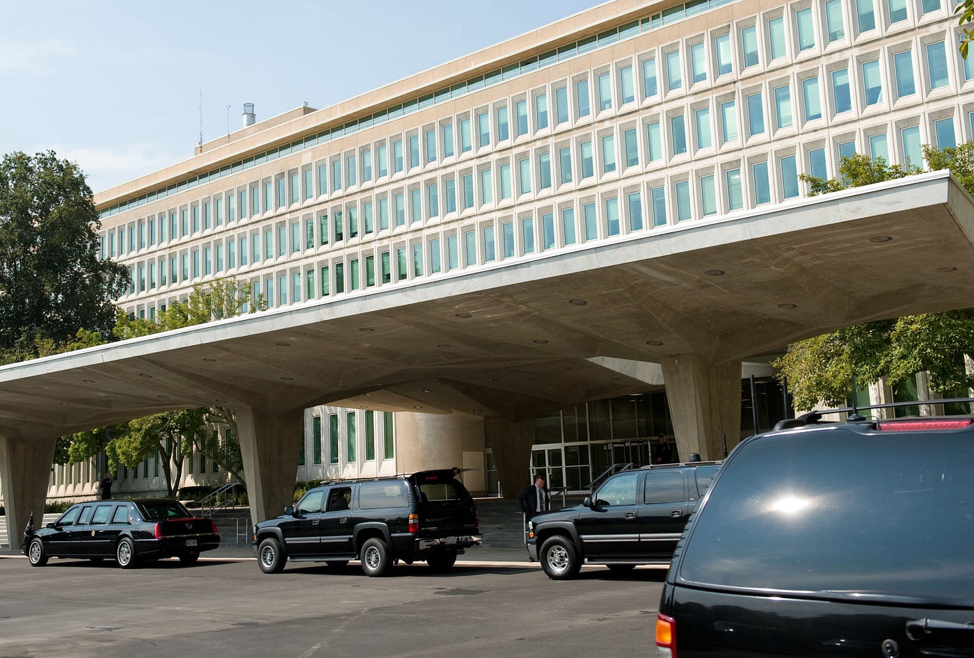 Front of CIA Headquarters at Langley with Director Casey’s Limousine and Escort SUVs at the ready.
Biography of Dr. Anthony J. Carbone.