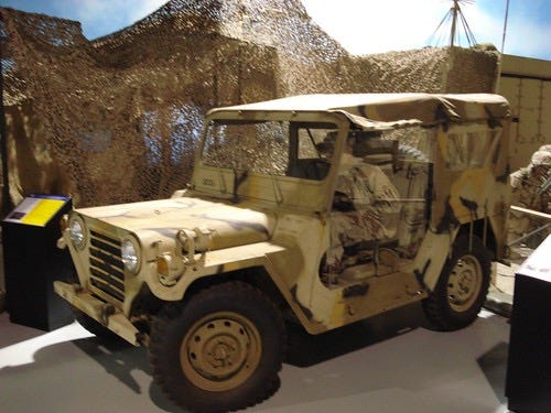 M151 quarter ton truck, better known as the Jeep, in desert camouflage.  Biography of Dr. Anthony J. Carbone.