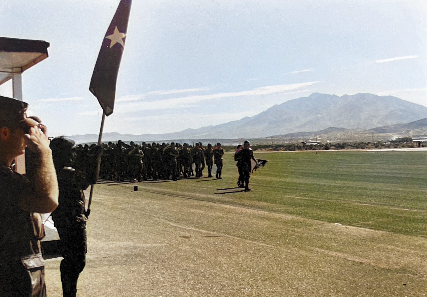 Parade field at Fort Irwin, California.  I am one of the officers in the first rank of HQs & Headquarters Company, 6–31st Infantry Pass-In-Review.  Biography of Dr. Anthony J. Carbone.