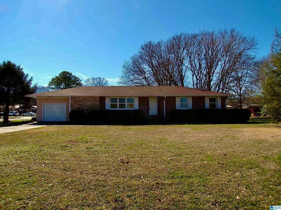 My off-post house, 316 Lenlock Drive, Anniston, Alabama.  Biography of Dr. Anthony J. Carbone.