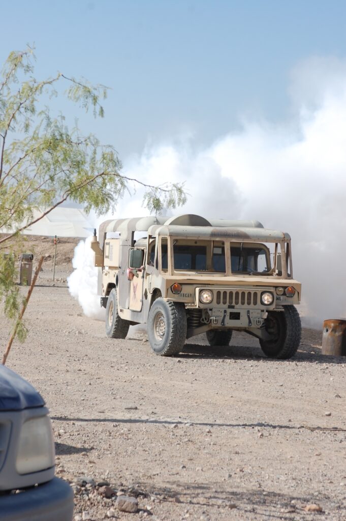 Members of the Chemical Smoke Platoon laying down smoke and obscurants during battles at the National Training Center at Fort Irwin, California.  Biography of Dr. Anthony J. Carbone.