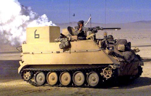 Members of the Chemical Smoke Platoon laying down smoke and obscurants during battles at the National Training Center at Fort Irwin, California.  Biography of Dr. Anthony J. Carbone.