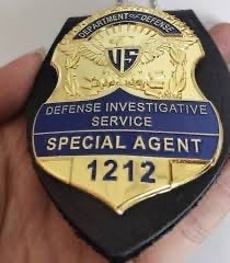 Badge of Defense Investigative Service Special Agent.
Biography of Dr. Anthony J. Carbone.